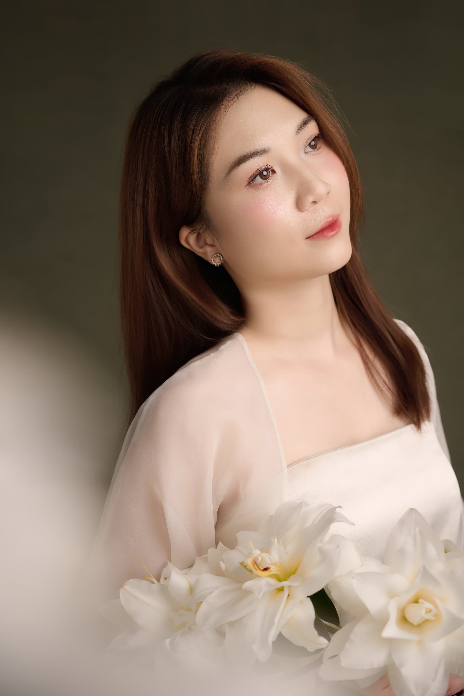 Chân dung Thu An — gương mặt nhẹ, ánh mắt dịu — đã làm mẹ một lần, sắp làm mẹ thêm một lần nữa