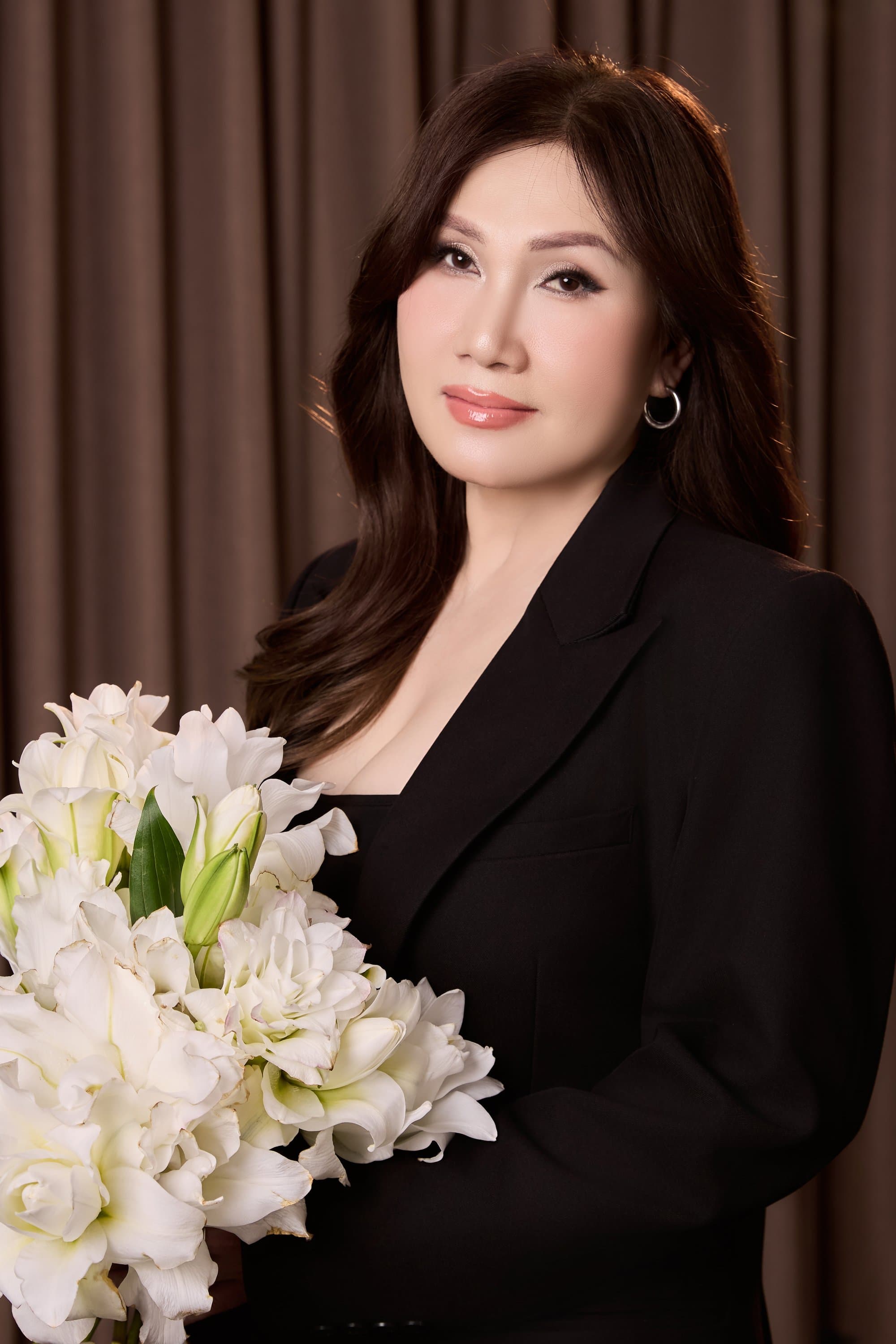 Khi thời gian ngồi xuống trên vai mẹ